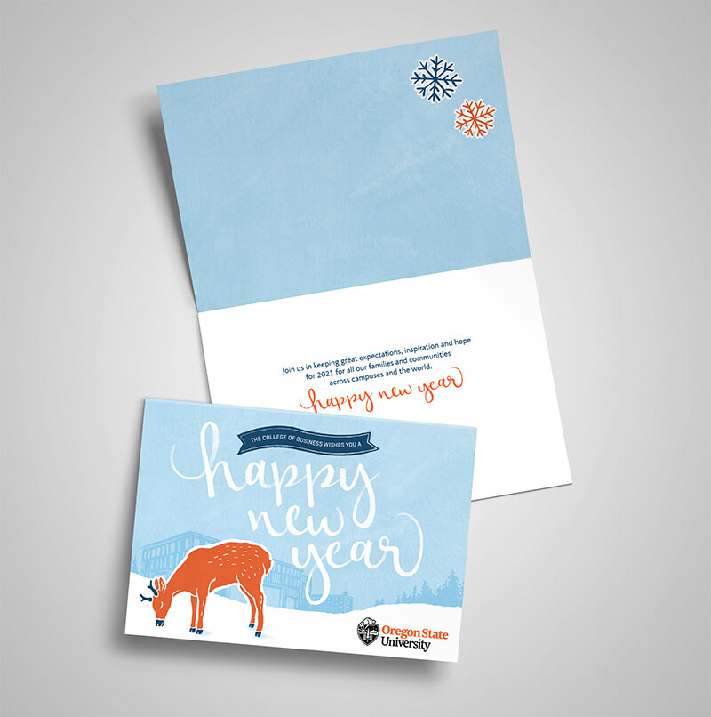 Holiday card with an illustration of a deer and Austin hall, with custom hand-done typography