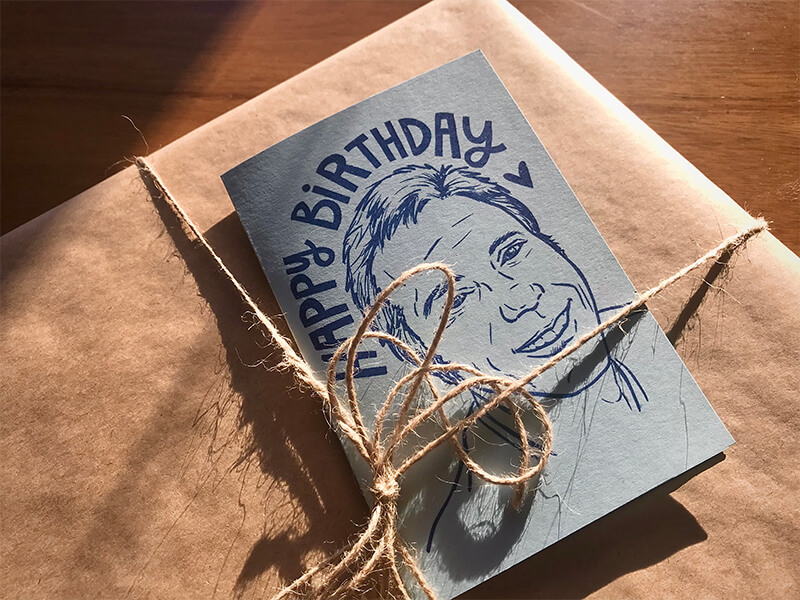birthday card with hand-drawn portrait in riso blue